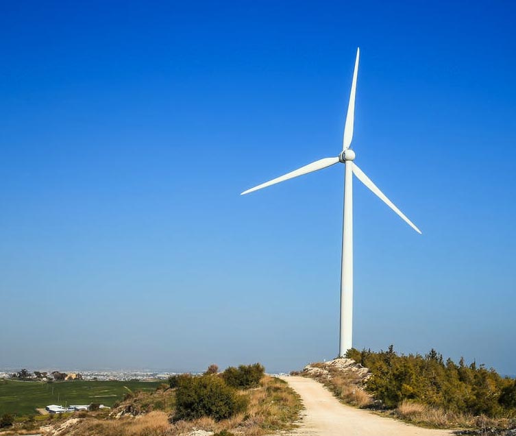 ISO 14001 ENVIRONMENTAL MANAGEMENT STANDARD. Reclaimed land and windmill image.