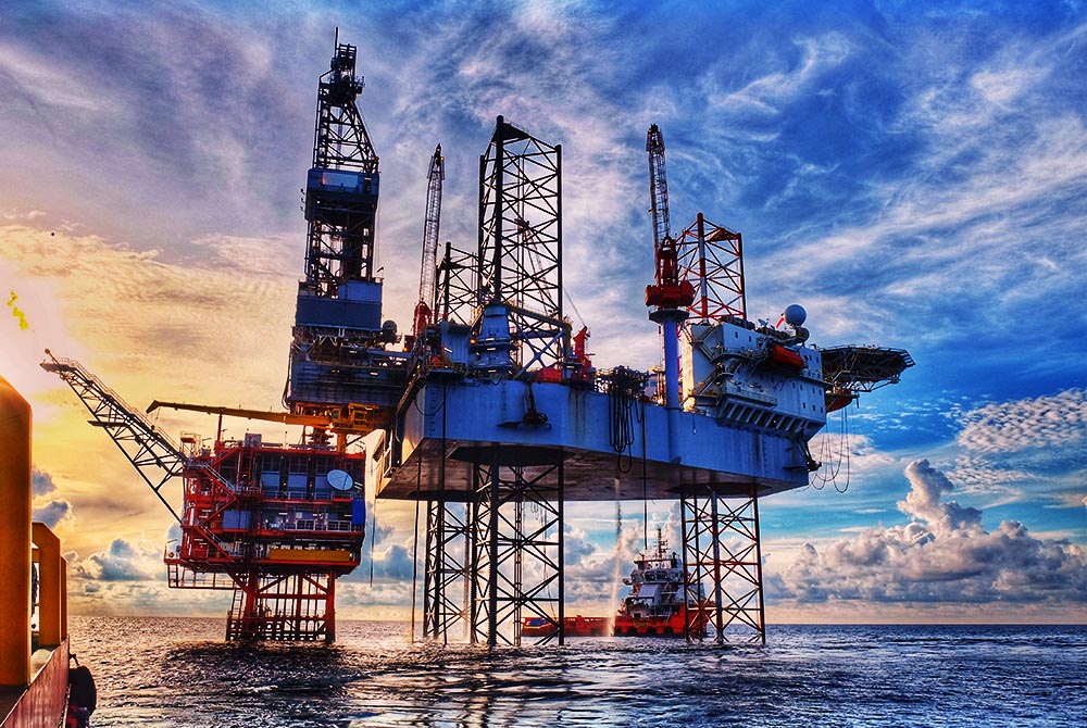 API Q1 Q2 are Quality Management Standards for the Oil and Gas industry. Oil platform image.
