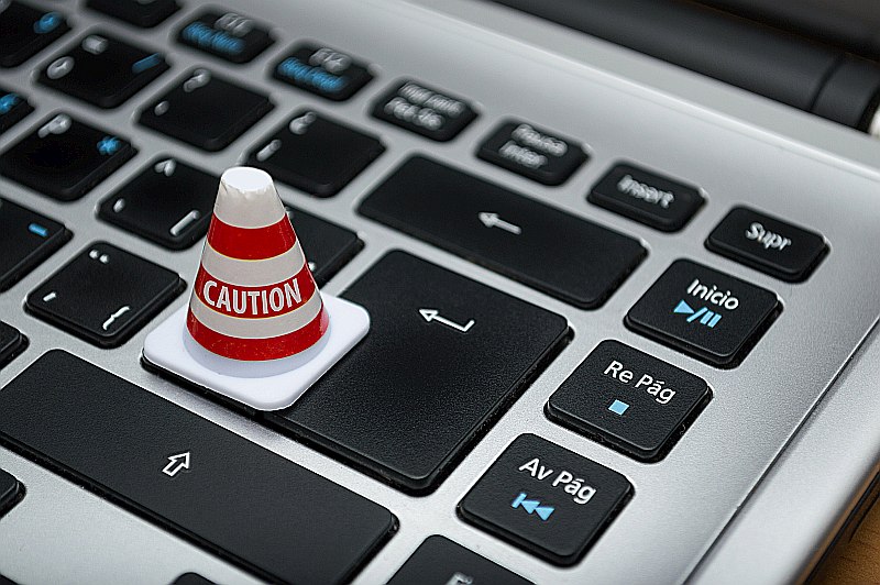 GDPR & Privacy image showing a keyboard with a small 'caution' cone like those used on pavements.